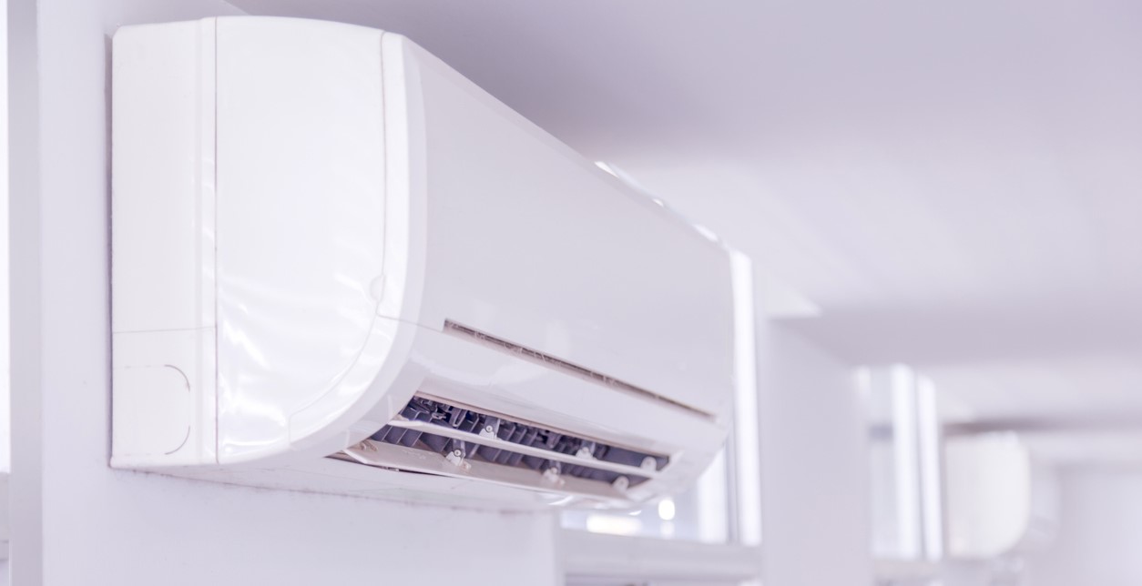 Ductless air conditioner mounted on wall