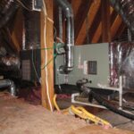 ductwork and furnace system connected in an attic