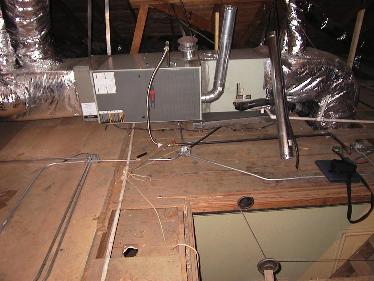 attic HVAC unit and air ducts