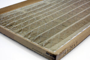 Dirty home air conditioner filter. Horizontal.