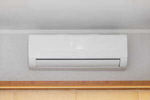 Ductless mini split on residential wall